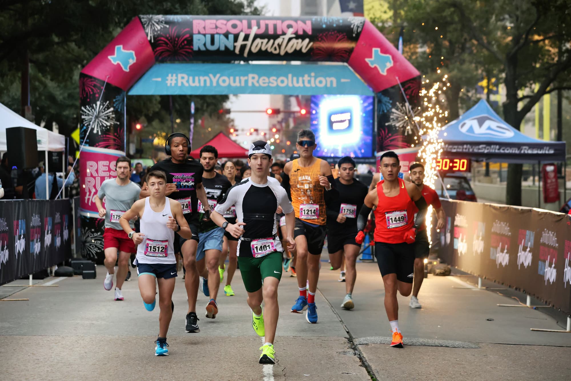 Resolution Run Houston runners on a downtown street