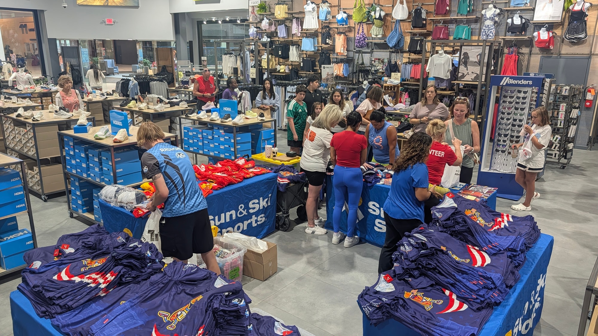 Packet pickup running from branded tables inside a retail store